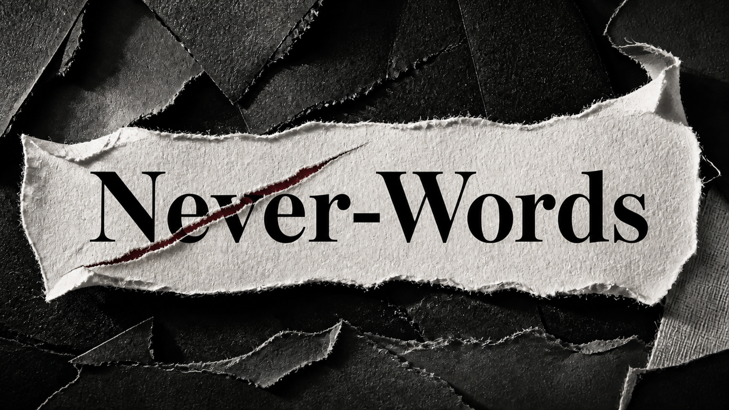 The words ‘Never-Words’ appear on a dimensional torn-paper strip above discarded black-and-white scraps; a subtle red diagonal tear rises through ‘Never.’