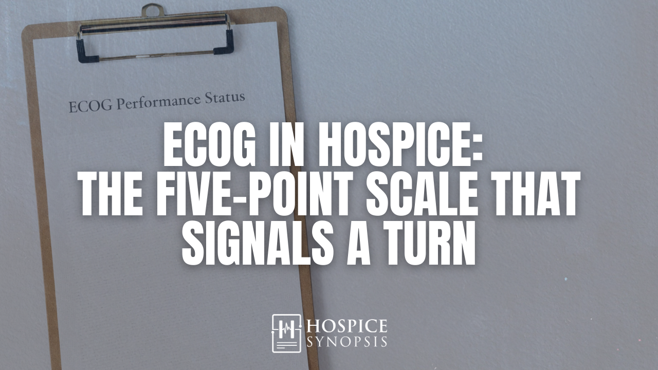 Clipboard labeled “ECOG Performance Status” on a pale blue background.